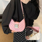 Sac à bandoulière matelassé à motif boulettes pour femme