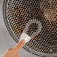 Brosse multifonction pour nettoyer les poêles