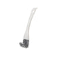 Brosse multifonction pour nettoyer les poêles
