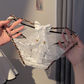 Culotte en dentelle bordée de léopard avec nœud
