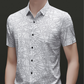 Chemise à col et manches courtes pour homme, au motif géométrique abstrait chic