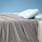 Couette d'été réversible et rafraîchissante