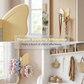 Crochet mural papillon rotatif