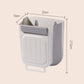 🗑️ Gagnez de la place sur votre plan de travail pendant la préparation des repas – Poubelle suspendue pliable pour déchets alimentaires. Nettoyage facile. Moitié prix. Livraison gratuite au Royaume-Uni.